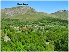 Le village d'Arcizans Dessus en Val d'Azun avec le pic du Ladya au dernier plan